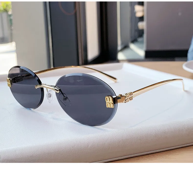 Unisex Oval Frame Frameless Sunglasses with PC Lens Material for Casual All Seasons Wear