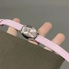 Women's Quartz Oval Dial Watch with PU Strap and Pin Buckle, Featuring Plexiglass Mirror and Pointer Display
